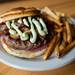 Cleary's Pub's "Guinness Burger" is a 1/2 lb. burger mixed with Guinness, onions, herbs and spices topped with sauteed mushrooms, bacon and a soy wasabi mayonnaise all served on a grilled pretzel roll.
Courtney Sacco I AnnArbor.con